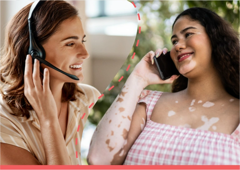 A combined photo of a Treatment Navigator and a young woman with Vitiligo separated by a red dotted line. On the left is the young woman with Vitiligo, wearing a pink and white top, smiling with her phone in her left hand up to her ear. On the right is the Treatment Navigator, who is a woman with short brown hair, wearing a beige top and a microphone headset smiling on the phone.